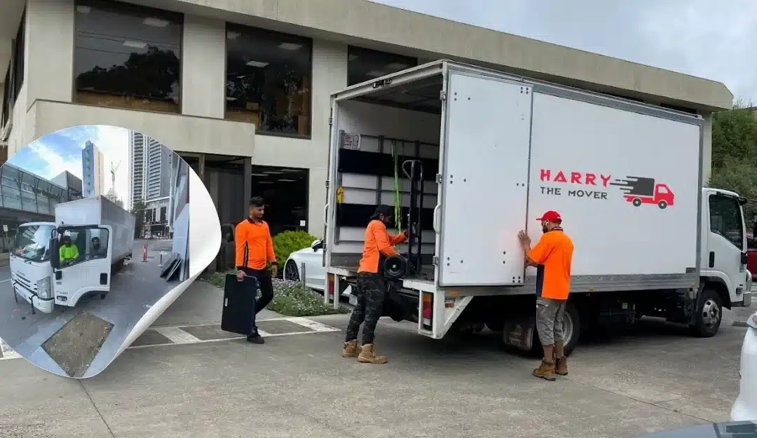 Harry The Mover Professional movers unloading a truck in front of a commercial building, showcasing efficient and reliable moving services.
